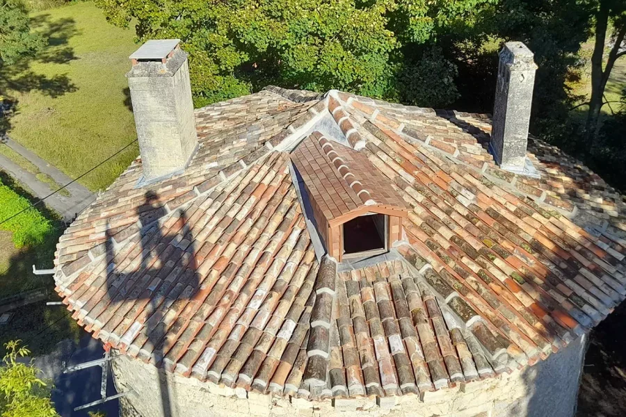 Réalisation d'une couverture en tuiles à Champagnac par Sébastien Menentaud, couvreur à Champagnac